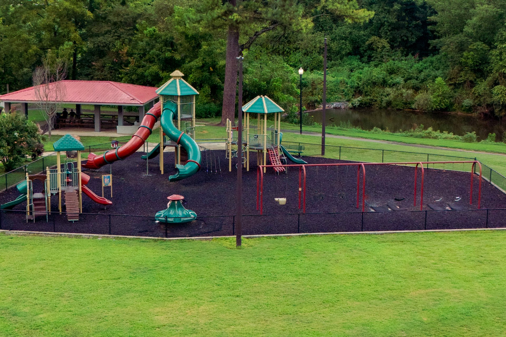 Playground, pavilion, and creek at River Park, Gilmer County Parks & Recreation